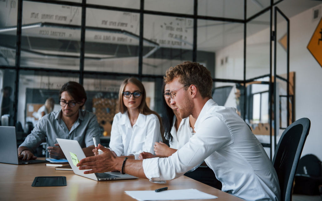 Young Business People In Formal Clothes Working In The Office