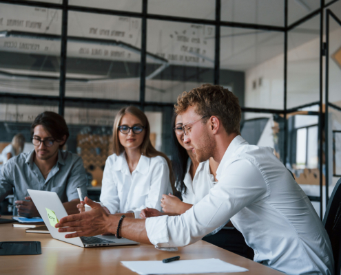 Young Business People In Formal Clothes Working In The Office